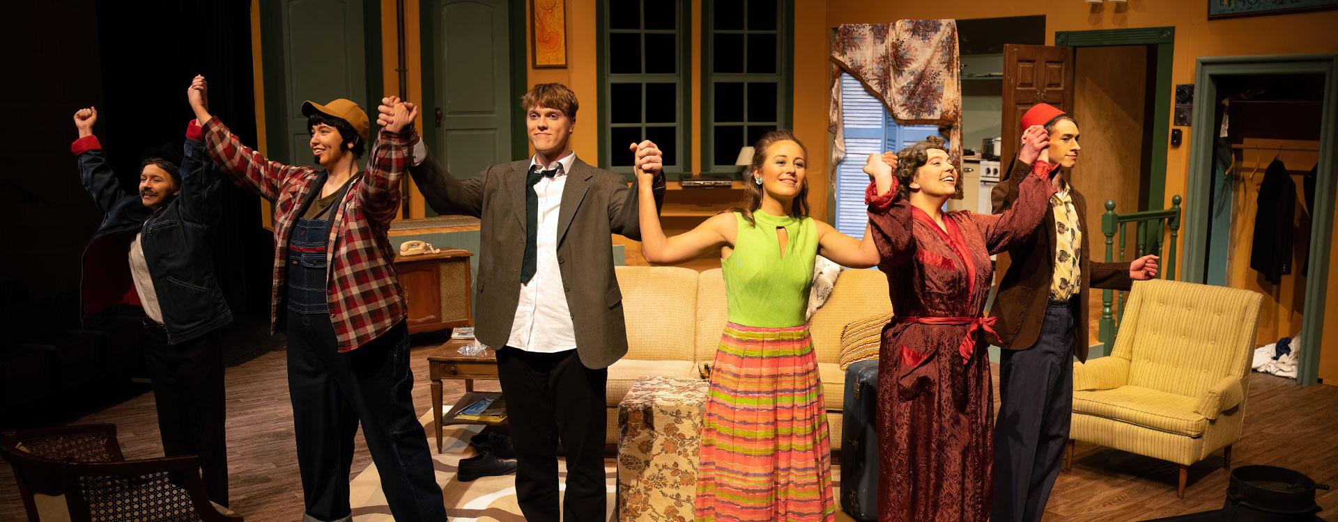 Students on Raabe Theatre stage for theatre production